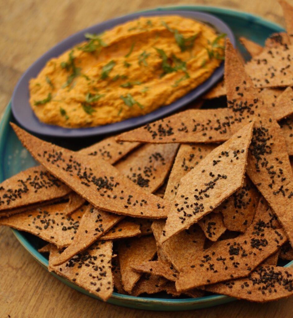 Flat bread crisps with lemon and harissa hummus Chetna Makan